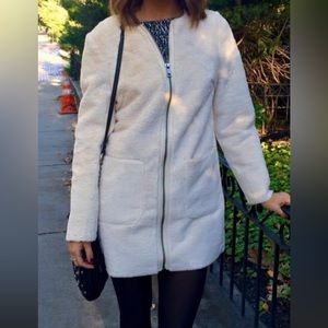 Cream colored soft jacket.